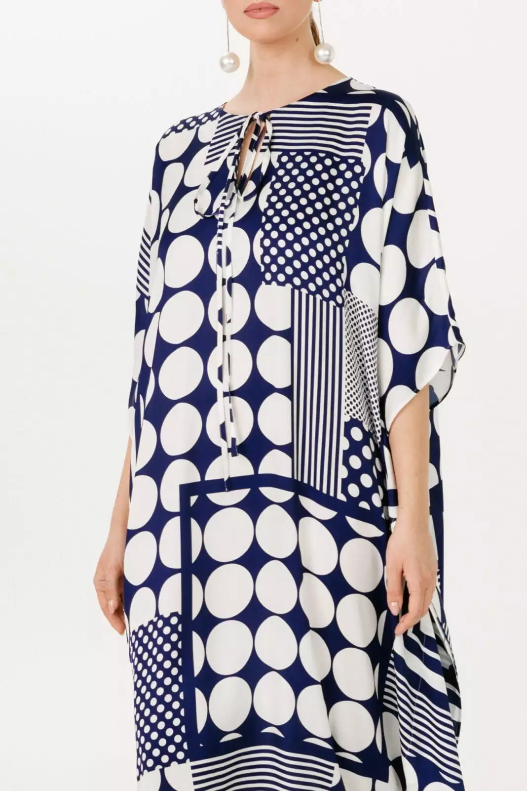 Mid length loose fit maxi kaftan dress in blue and white geometric print by House of Azoiia