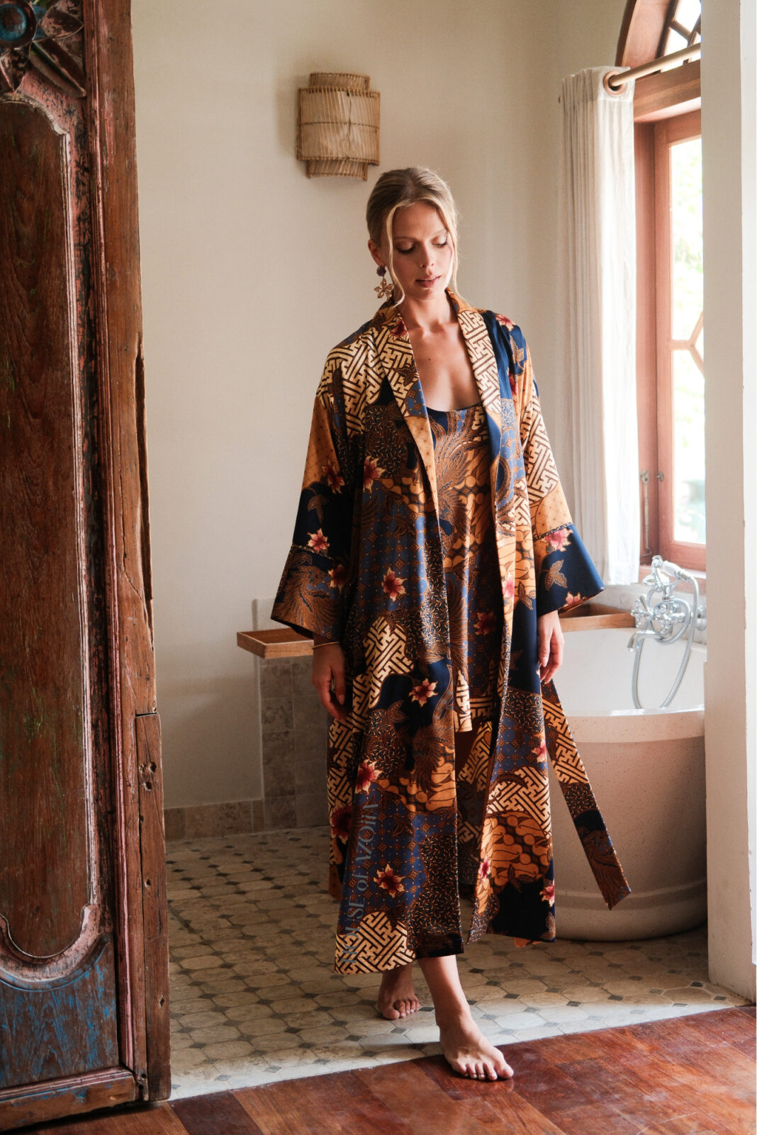 Maxi-length luxury silk blend kimono robe in blue floral batik print by House of Azoiia - Aya. Elegant and timeless loungewear for women.