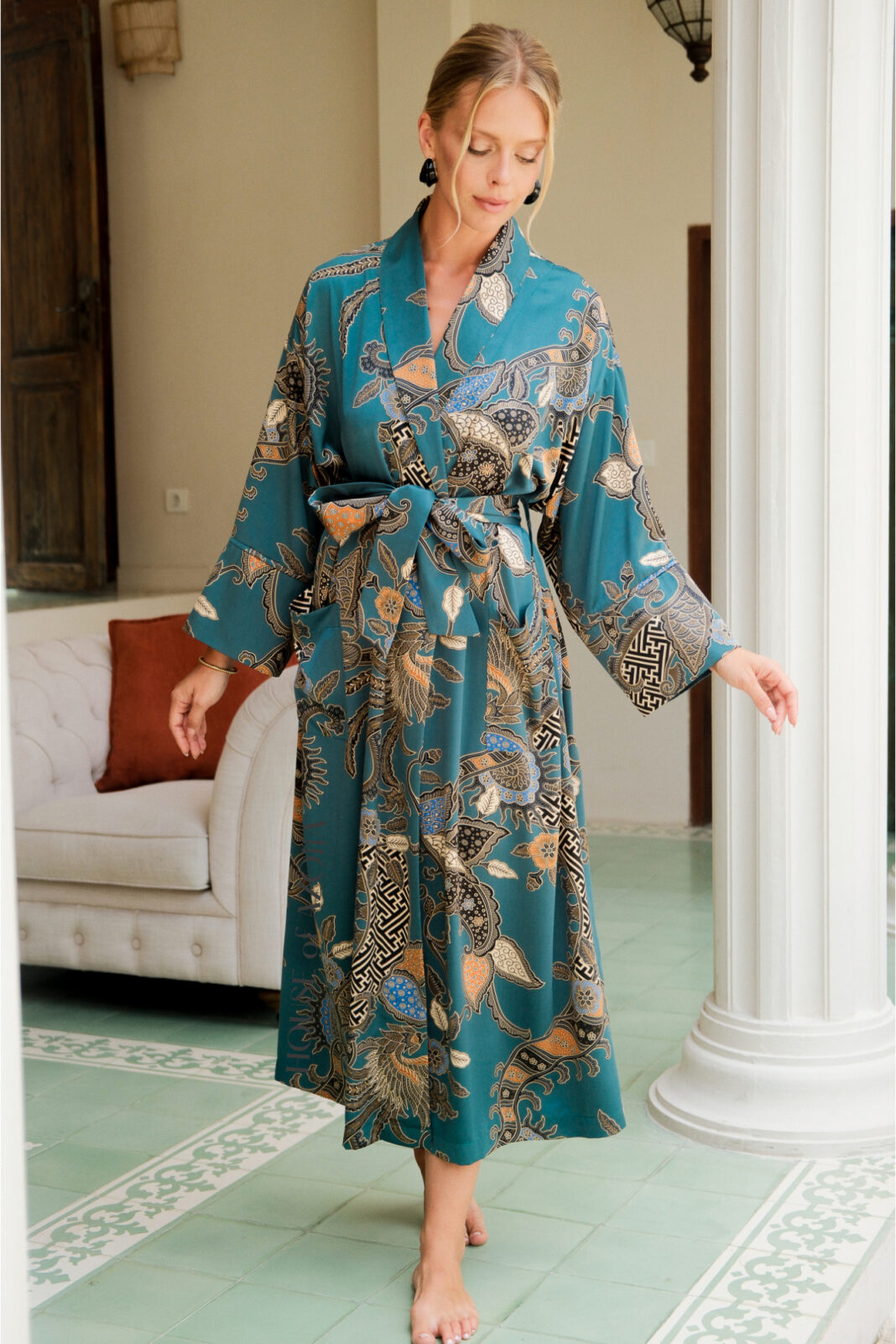 Medium length silk blend kimono dressing gown in green silk satin Balinese batik designed for relaxed fit by House of Azoiia - Aya.